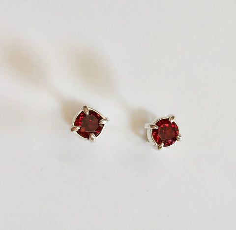 empower studs (garnets)